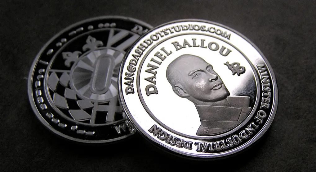 Create business cards from coins. No need from paper stock just coins with contact details to toss around.