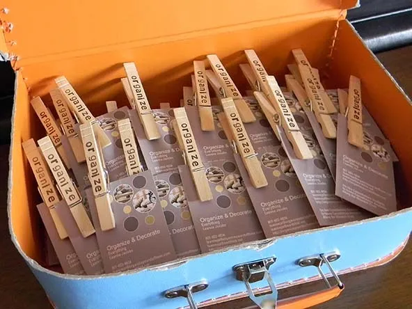 Pegs for business cards and get rid of paper stock.