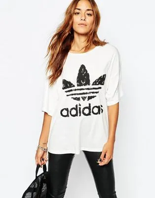 Oversized designs commonly have chest logo placement or full back placement either wit logos or text.