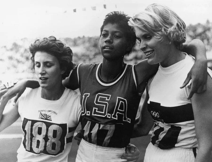 1960, Rome. Britain’s Dorothy Hyman earns bronze at the 200 metre race and poses with USA's Wilma Rudolph (gold) and Germany's Jutta Heine (silver).