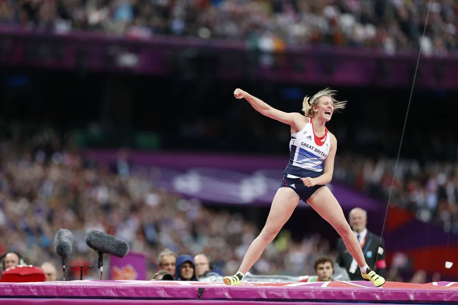 Holly Bleasdale shows her prowess in the pole vault while donning the controversial kit designed by Stella McCartney.