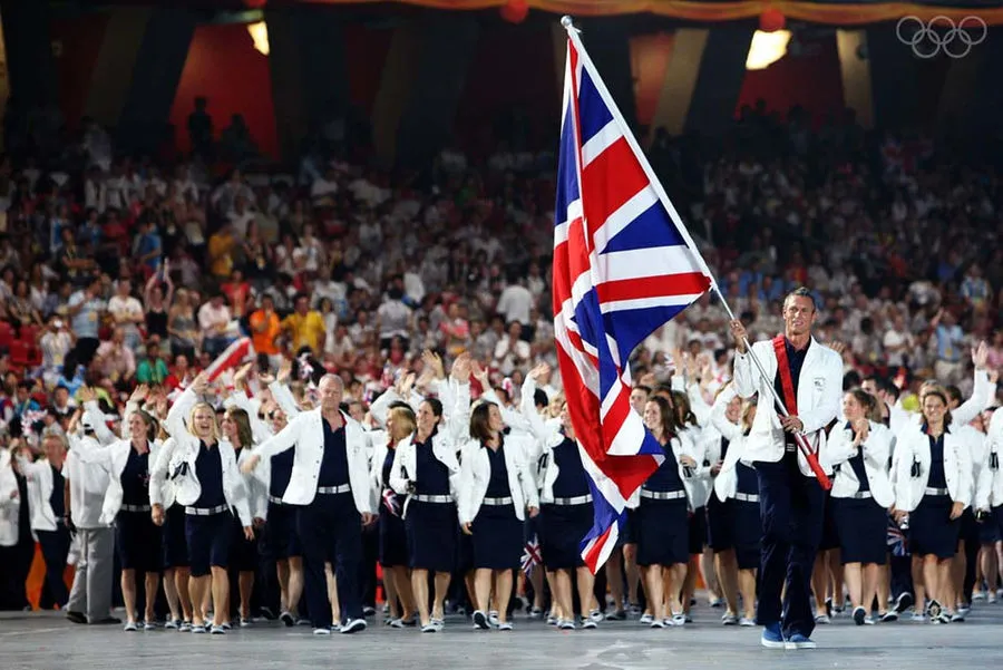 Swimmer Mark Foster of Great Britain carries his nation’s flag during the Opening Ceremony for the 2008 Beijing games.