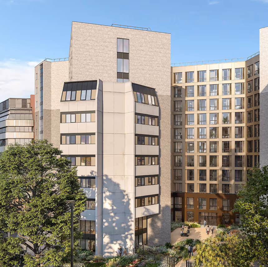 Modern apartment complex with beige and brick facades surrounding a landscaped courtyard with trees and people walking.