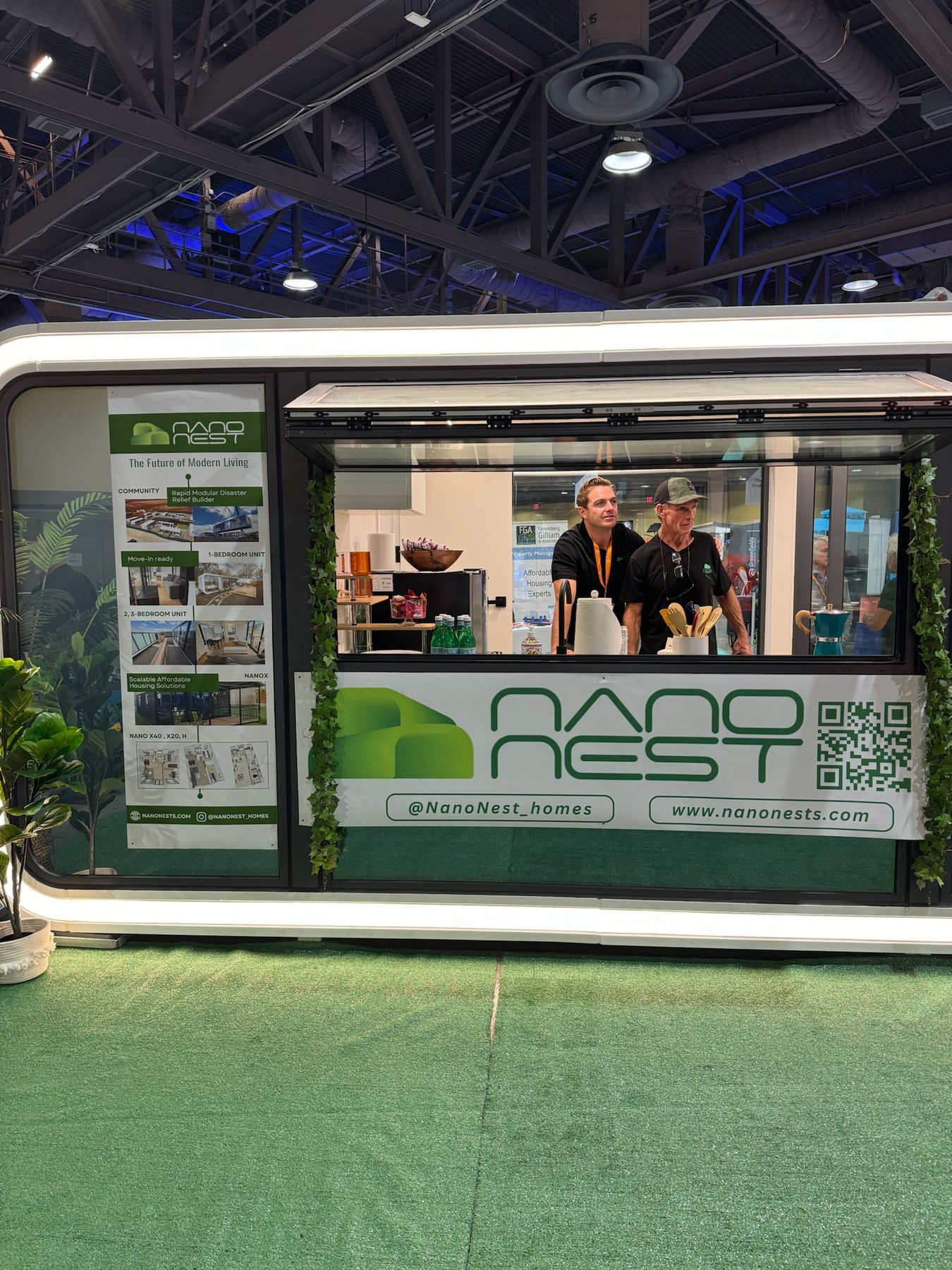 NanoNest trade show booth with QR code