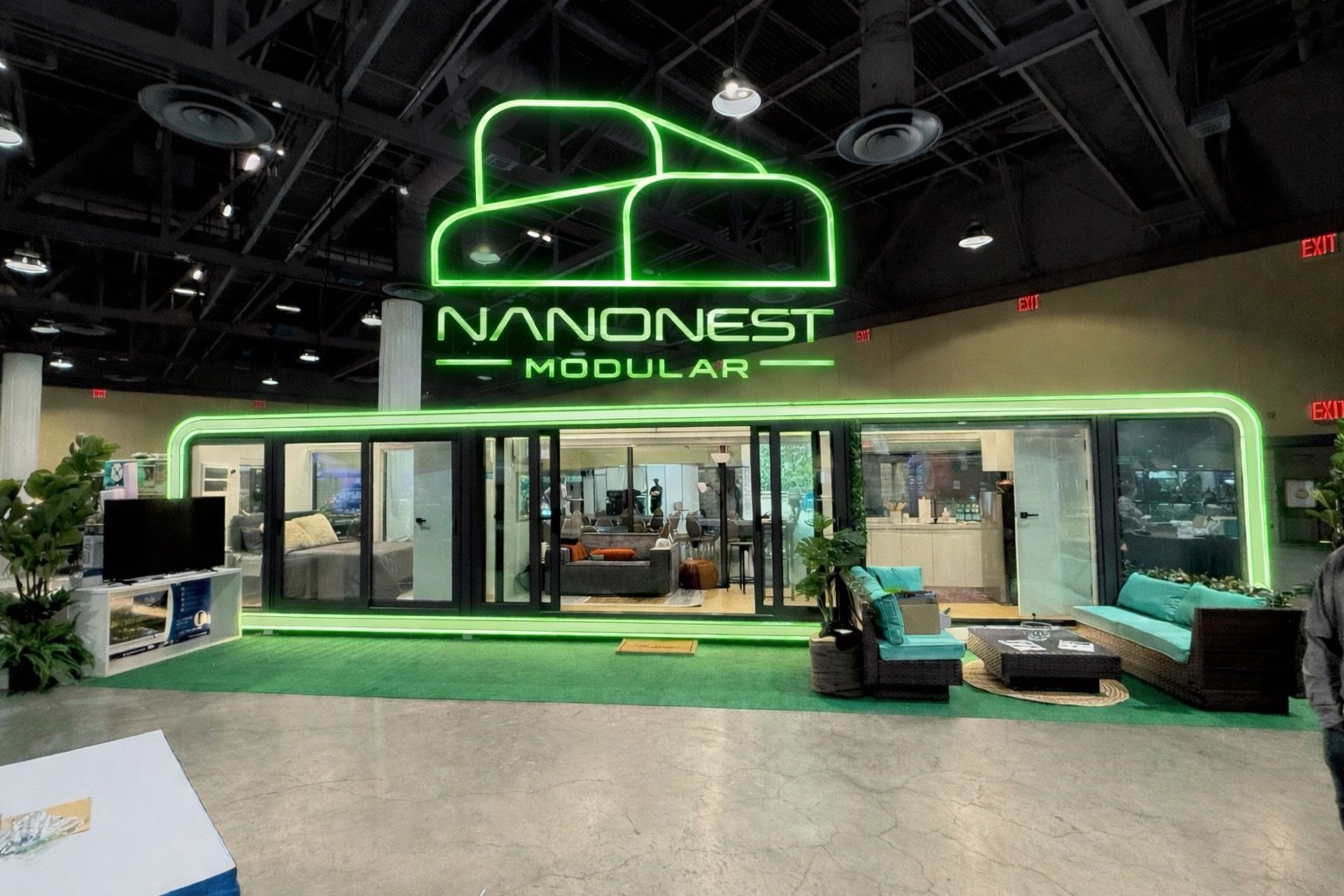 NanoNest Modular booth at night with neon