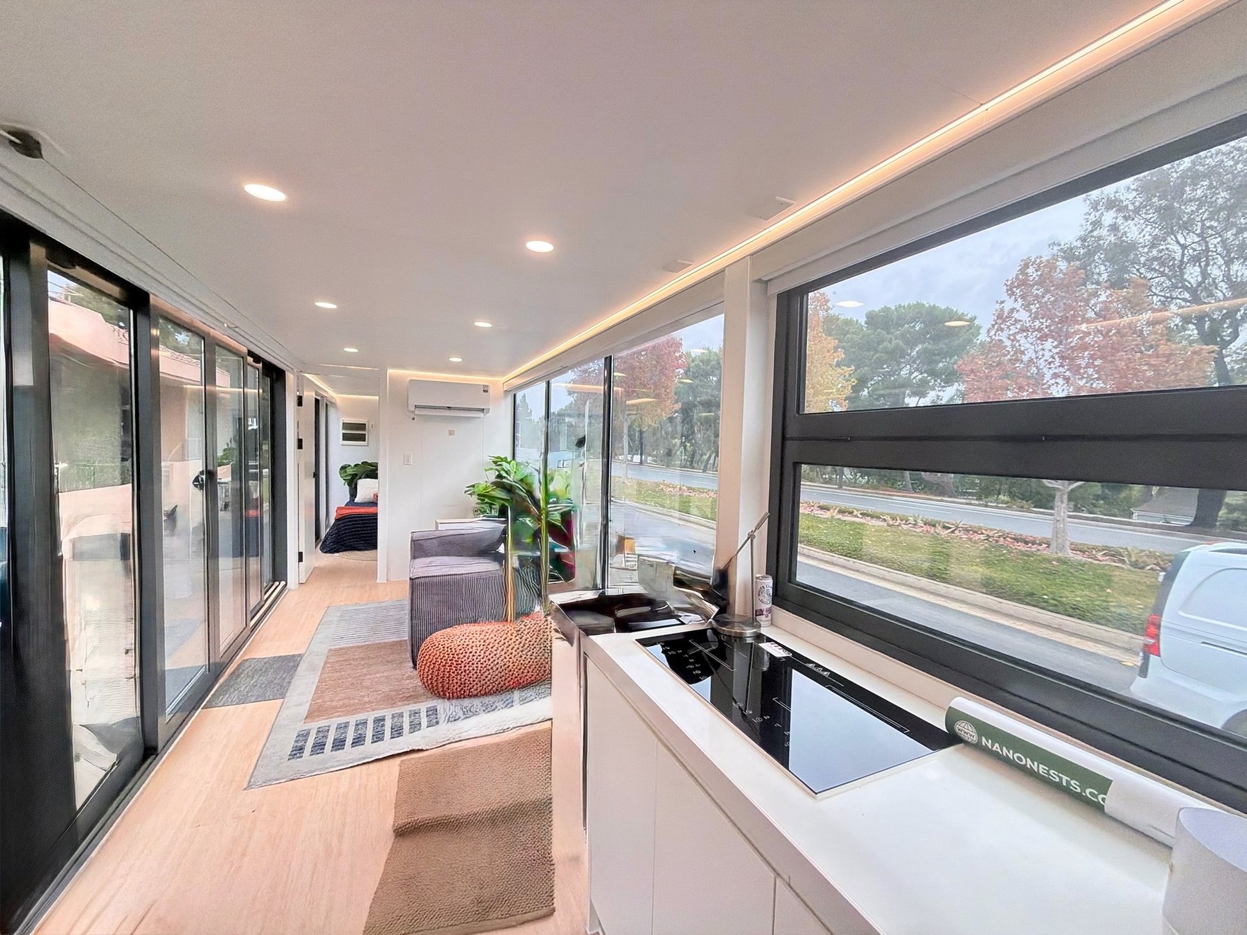 Interior wide view — kitchen, sofa, hallway