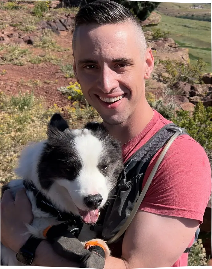Dr. Anthony Davis hiking with his dog