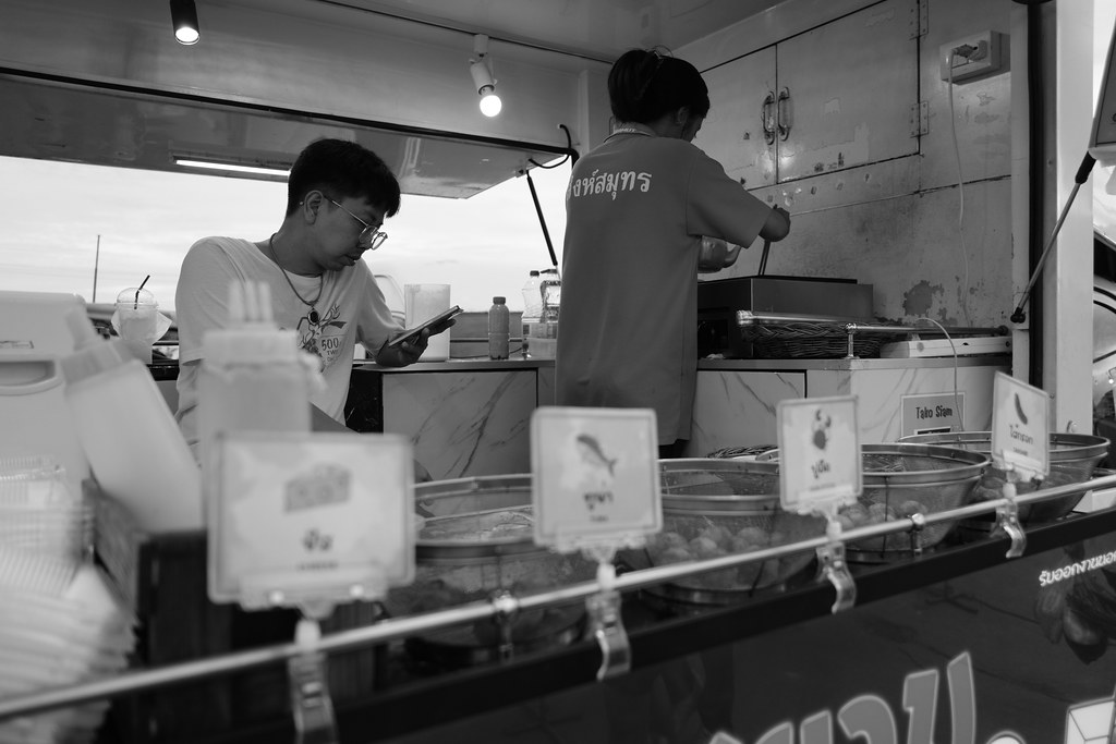 Food truck serving customers, representative of Chicken Lai Lai in Bella Vista, Arkansas