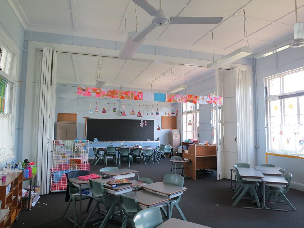 School building classrooms representative of Haas Hall Academy in Bentonville, Arkansas