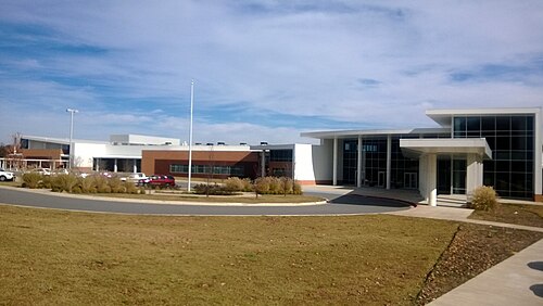 Arkansas public school building entrance, representative of Woodland Junior High School in Fayetteville, Arkansas