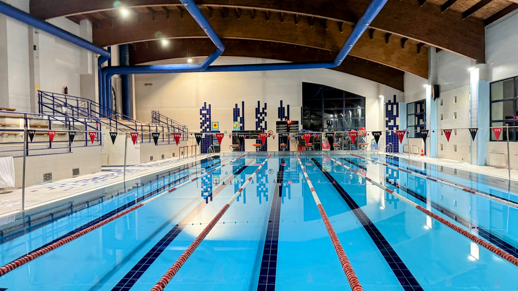 Indoor swimming pool with lap lanes (stock photo, not the Walton Family Whole Health & Fitness facility)