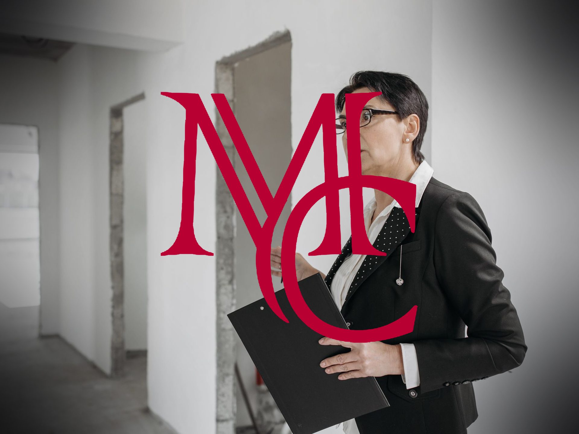 Woman in a suit holding a clipboard inside a house with the crimson Mason Capital Group monogram, illustrating home appraisal timing