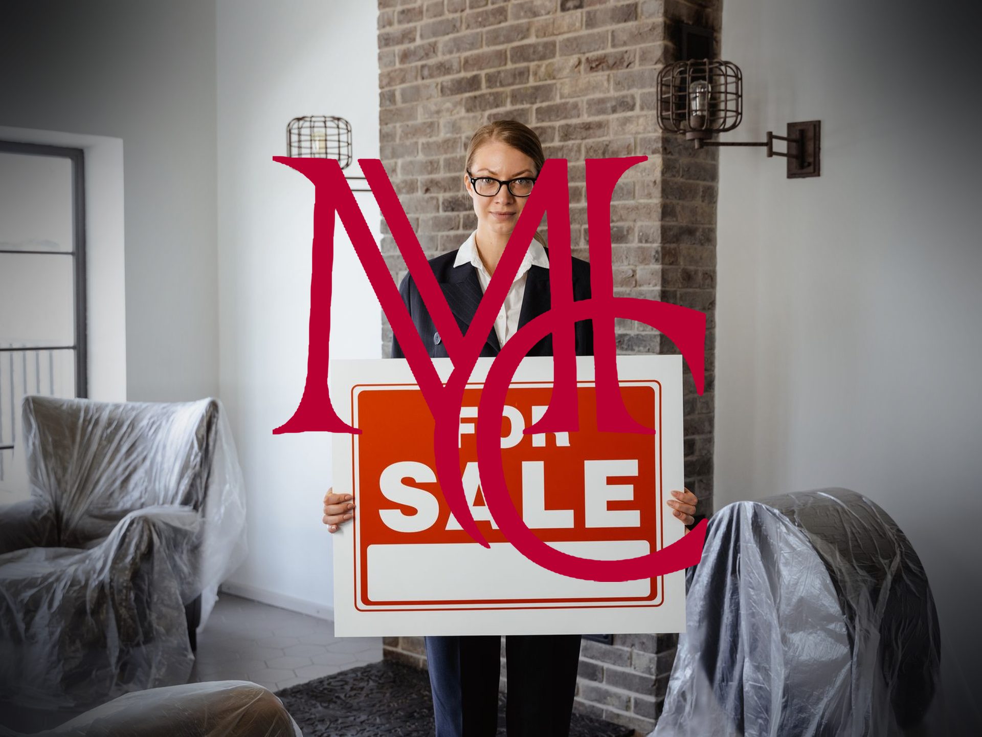 Real estate agent holding a For Sale sign in a living room with the crimson Mason Capital Group monogram, illustrating getting more listing exposure