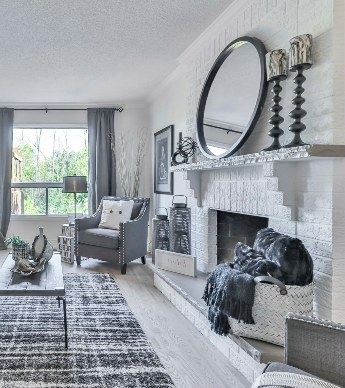 White masonry fireplace in living room