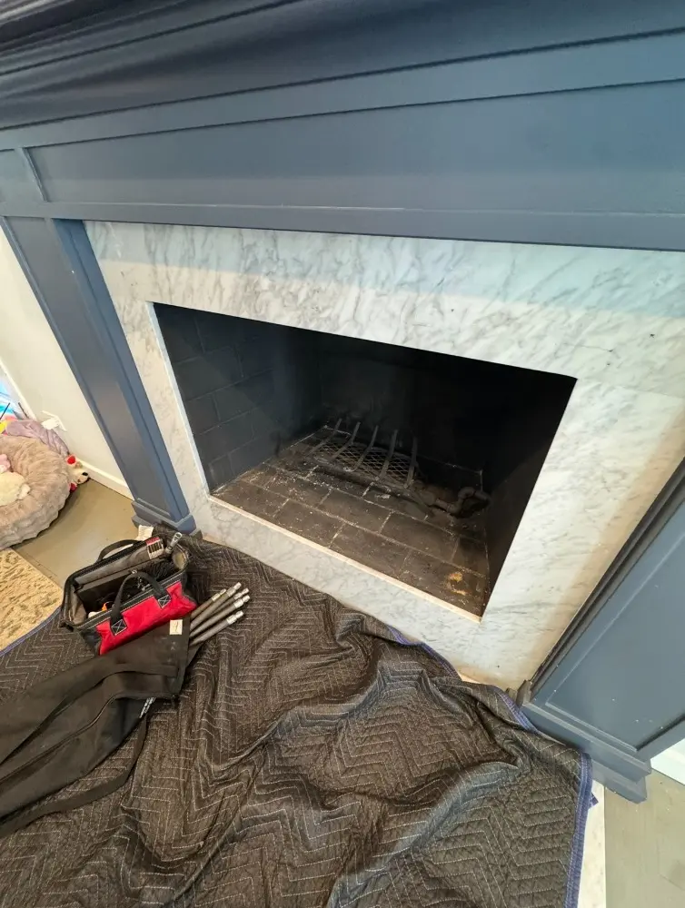 Image of a fireplace inspection in progress