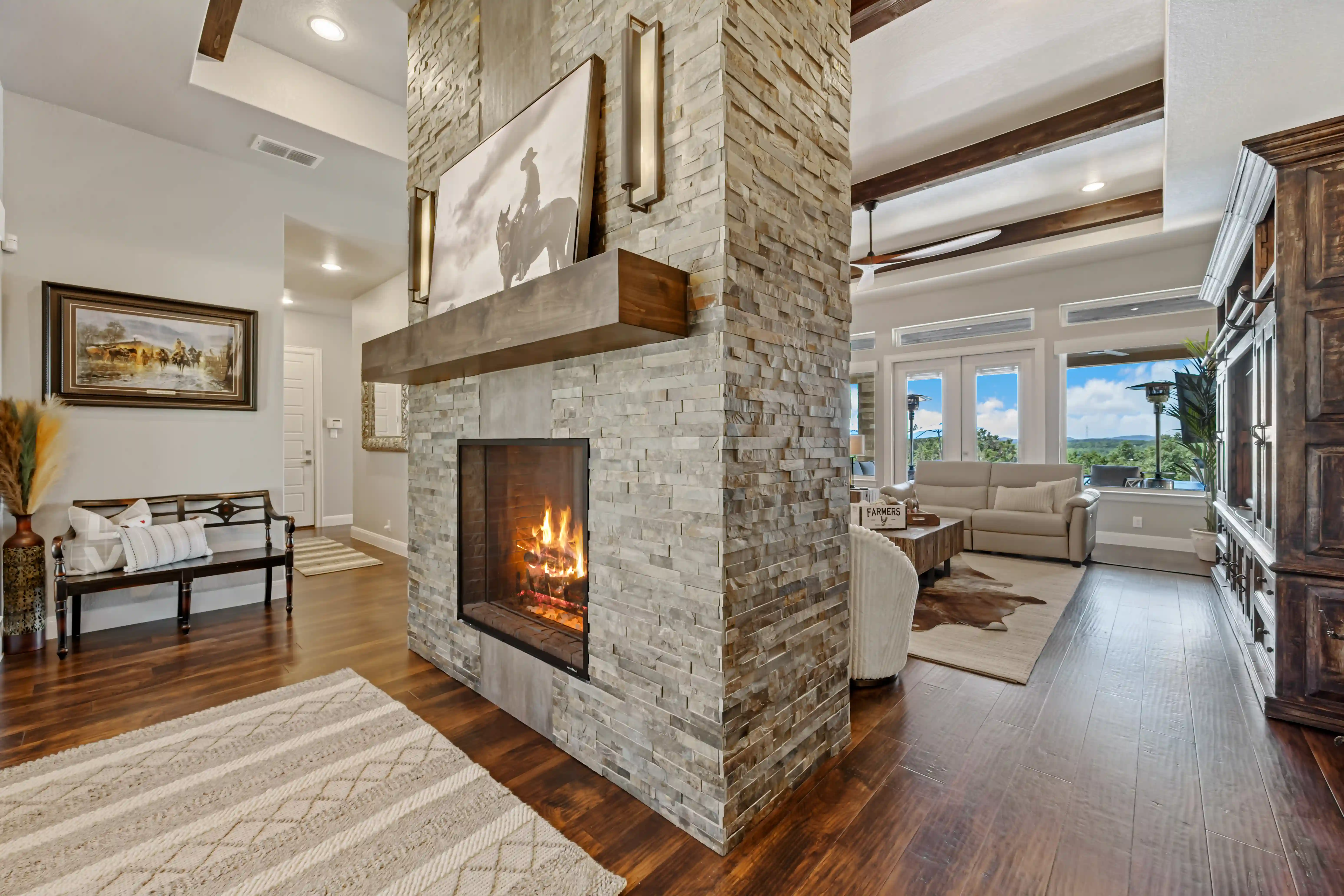 Lit fireplace in cozy living room