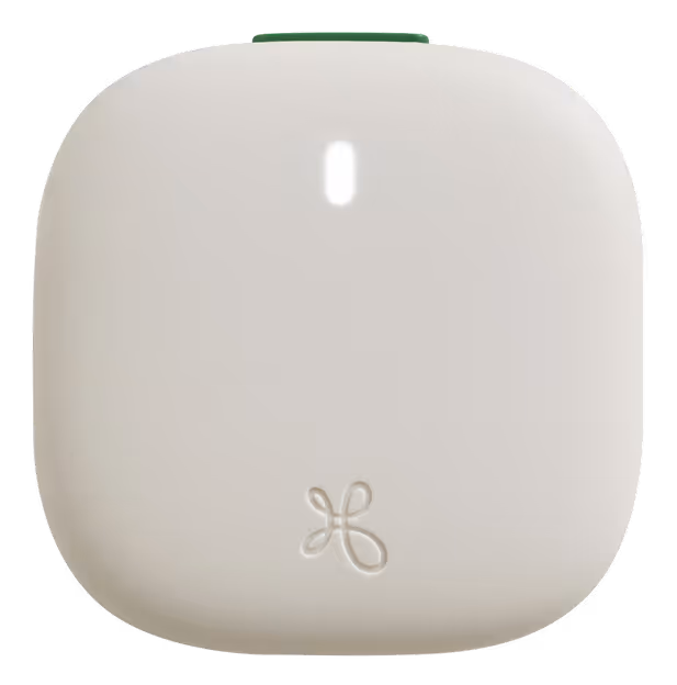 Minimalist white square device with rounded edges, a small vertical light in the center, and a green button on top.