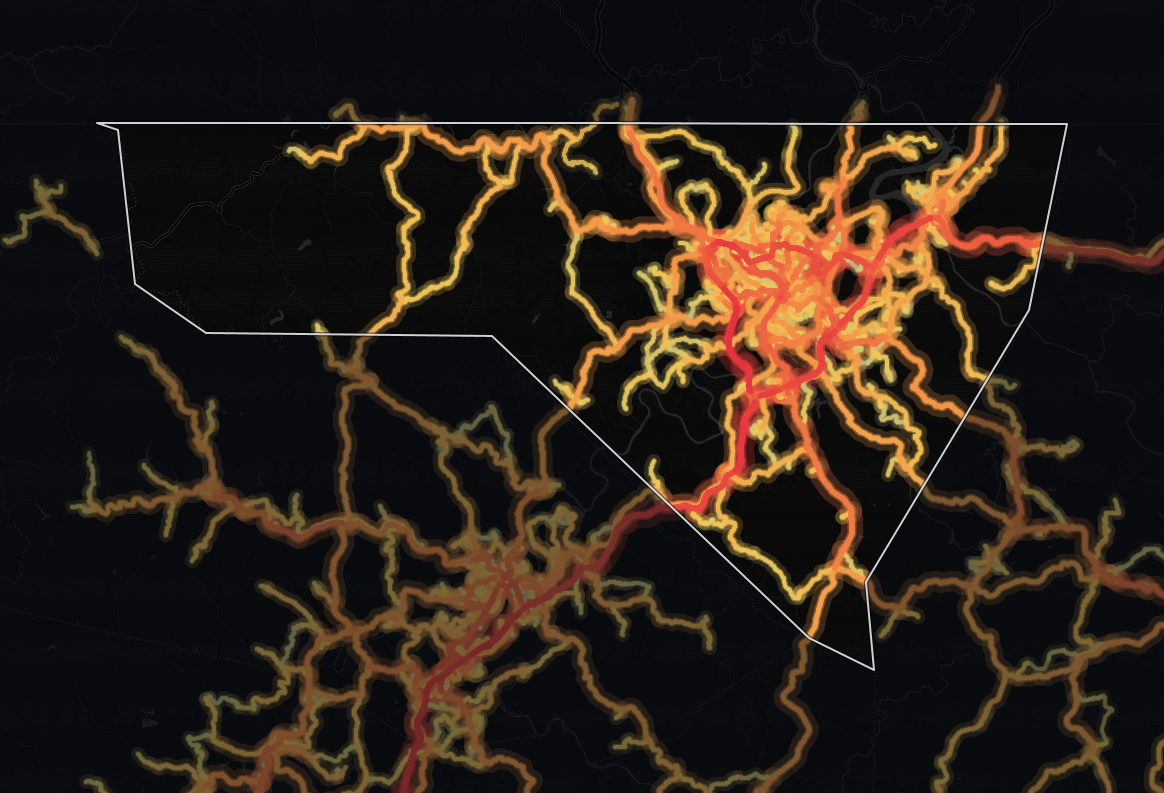 Traffic heat map of Monongalia County, West Virginia: 345 miles of roads shaded from blue (light) to red (heavy traffic)