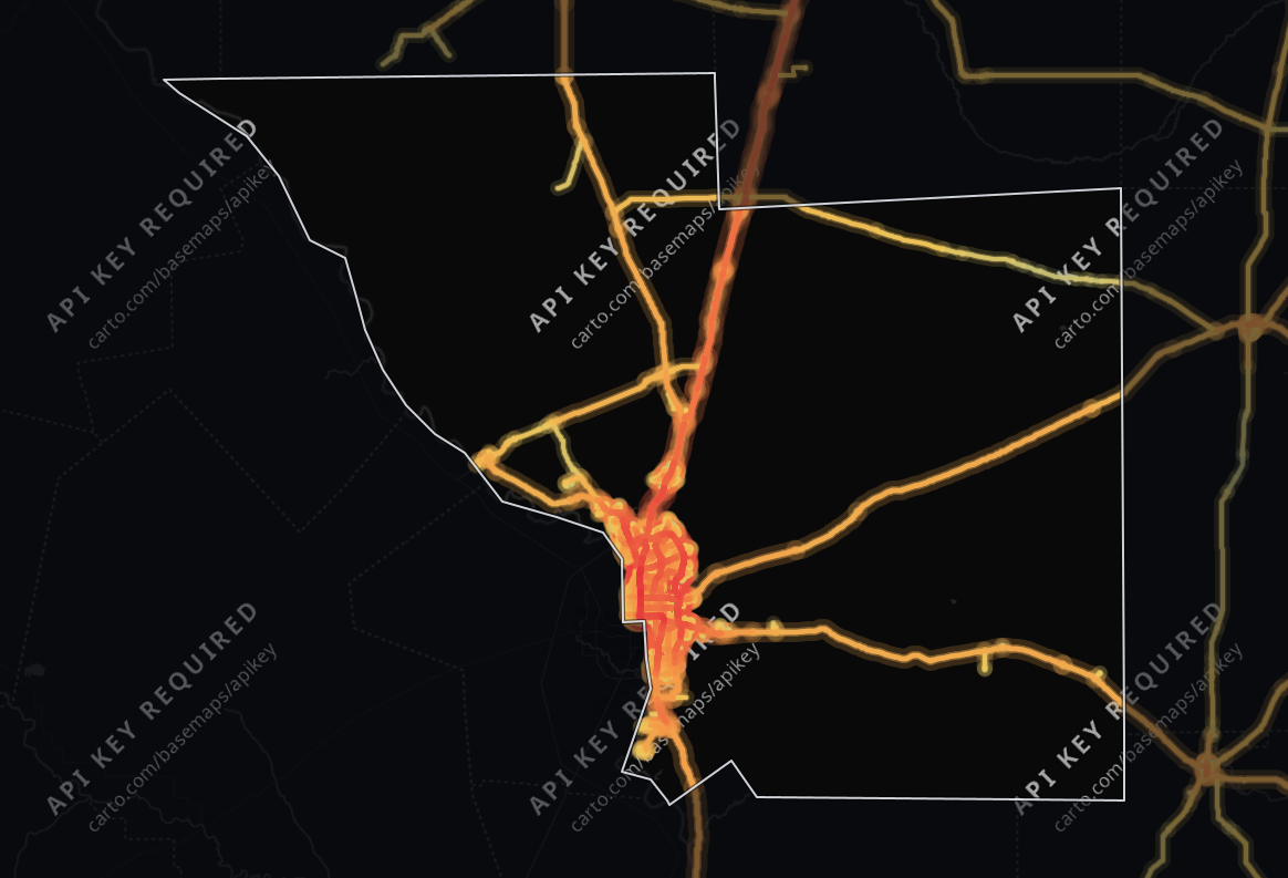 Traffic heat map of Webb County, Texas: 719 miles of roads shaded from blue (light) to red (heavy traffic), busiest on Bob Bullock Loop and Zapata Highway