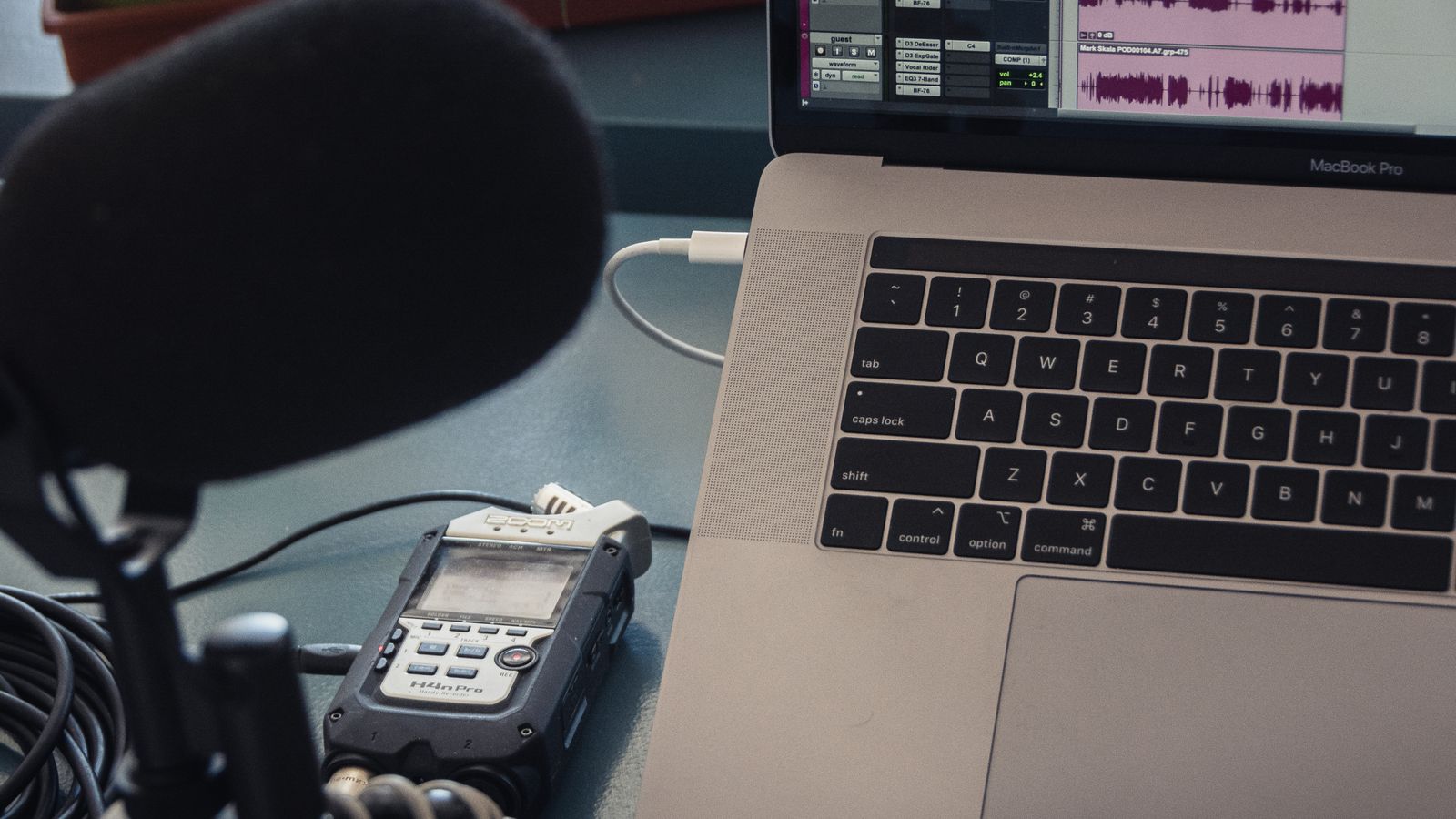 Microphone and laptop set up for audio capture at a desk