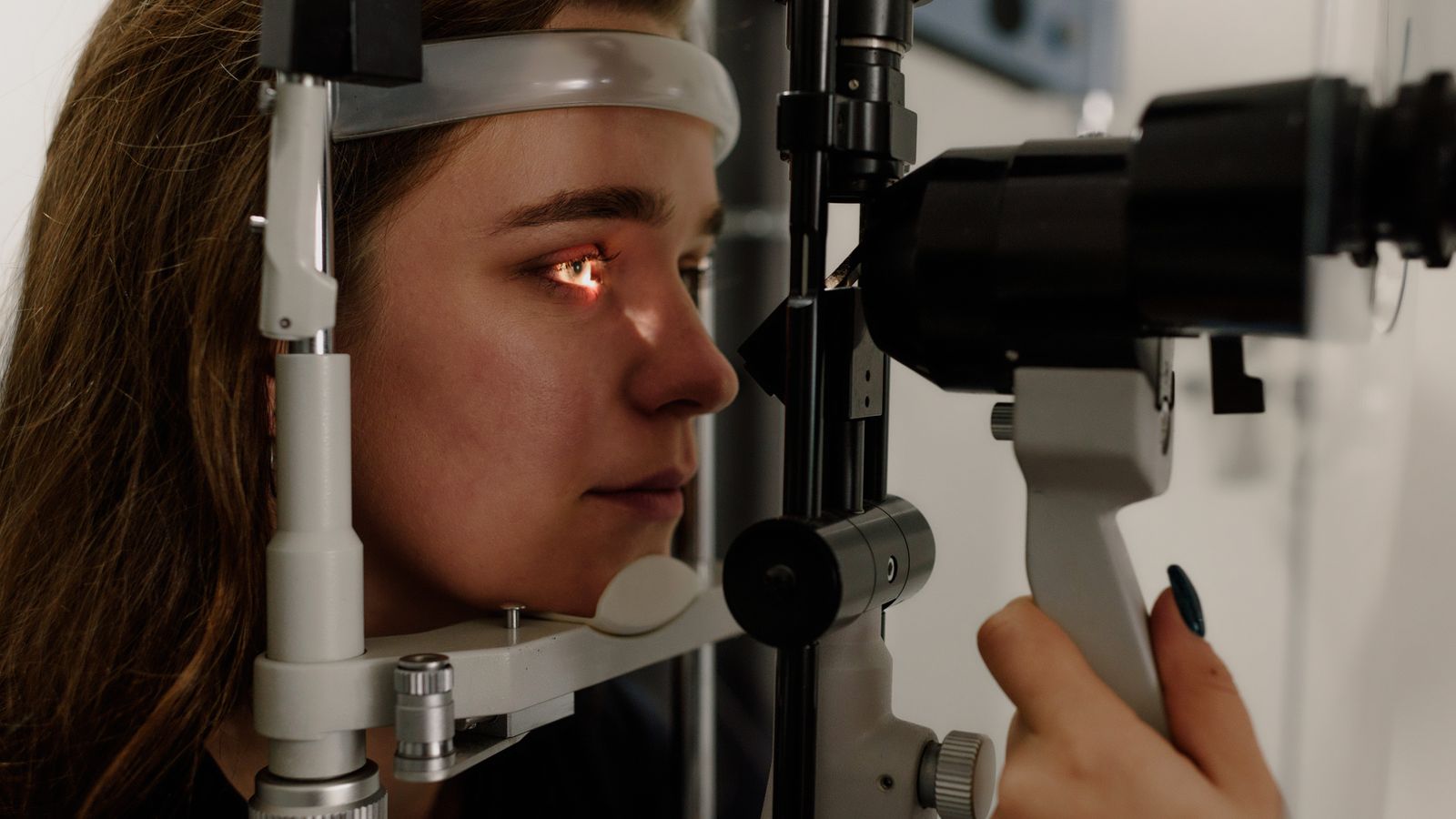 Patient at the slit lamp during an eye examination