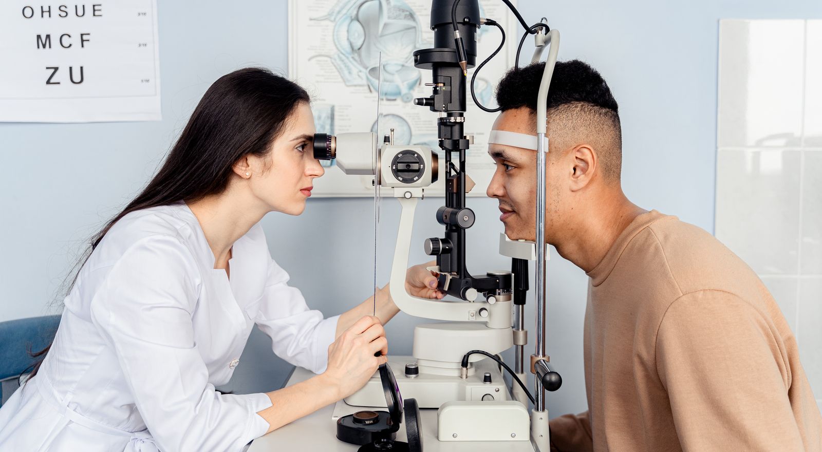 Optometrist conducting an eye exam with modern diagnostic equipment