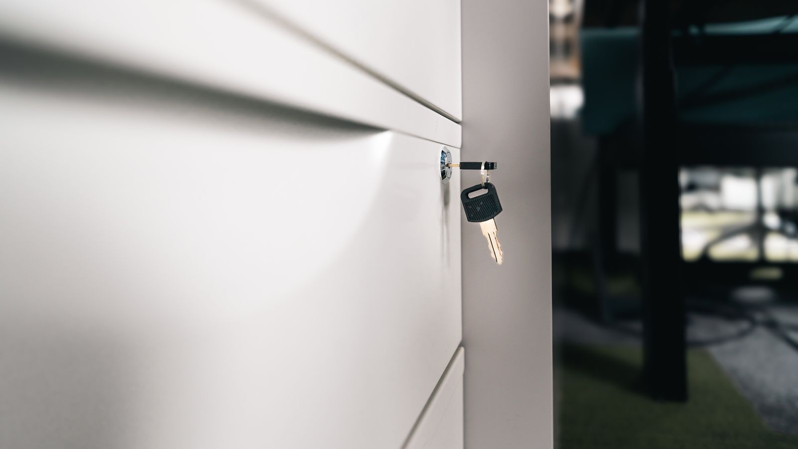 Key in the lock of a secured office drawer
