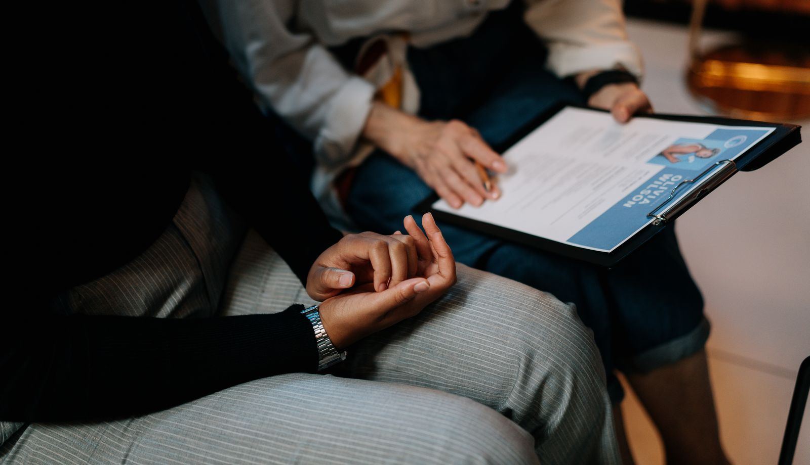 Reviewing a candidate's resume during a vetting interview