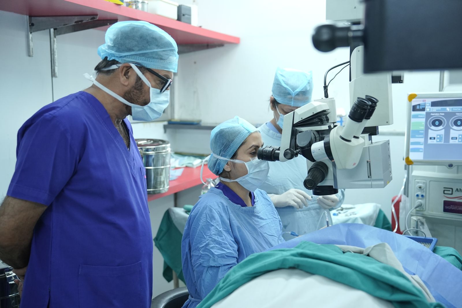 Surgical team performing cataract surgery in a hospital operating room