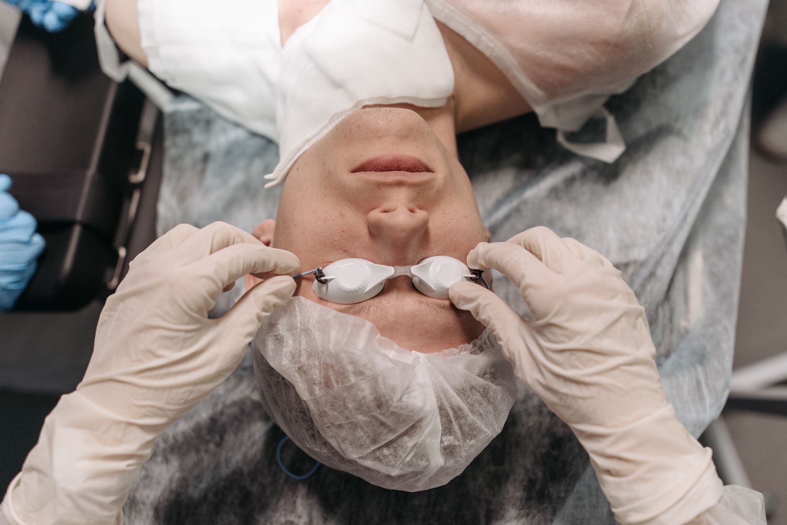 Patient positioned in an operating suite before an eye procedure