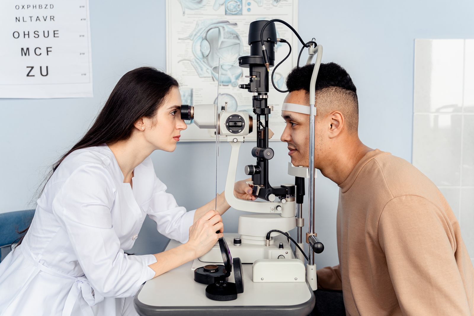 Optometrist conducting a pressure check during a comprehensive eye exam