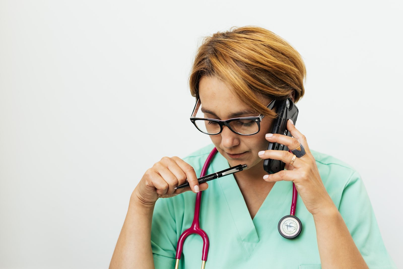 Eye doctor taking an after-hours phone call about a patient concern
