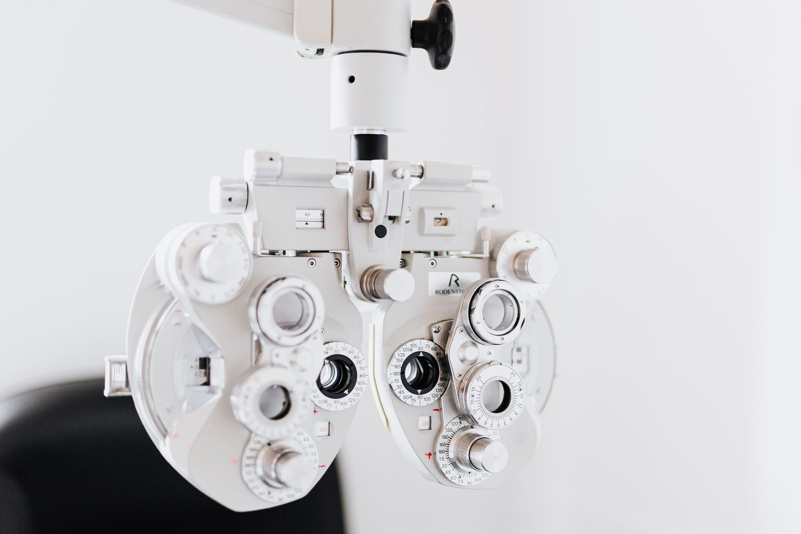 Phoropter in an exam lane ready for the next optometry patient
