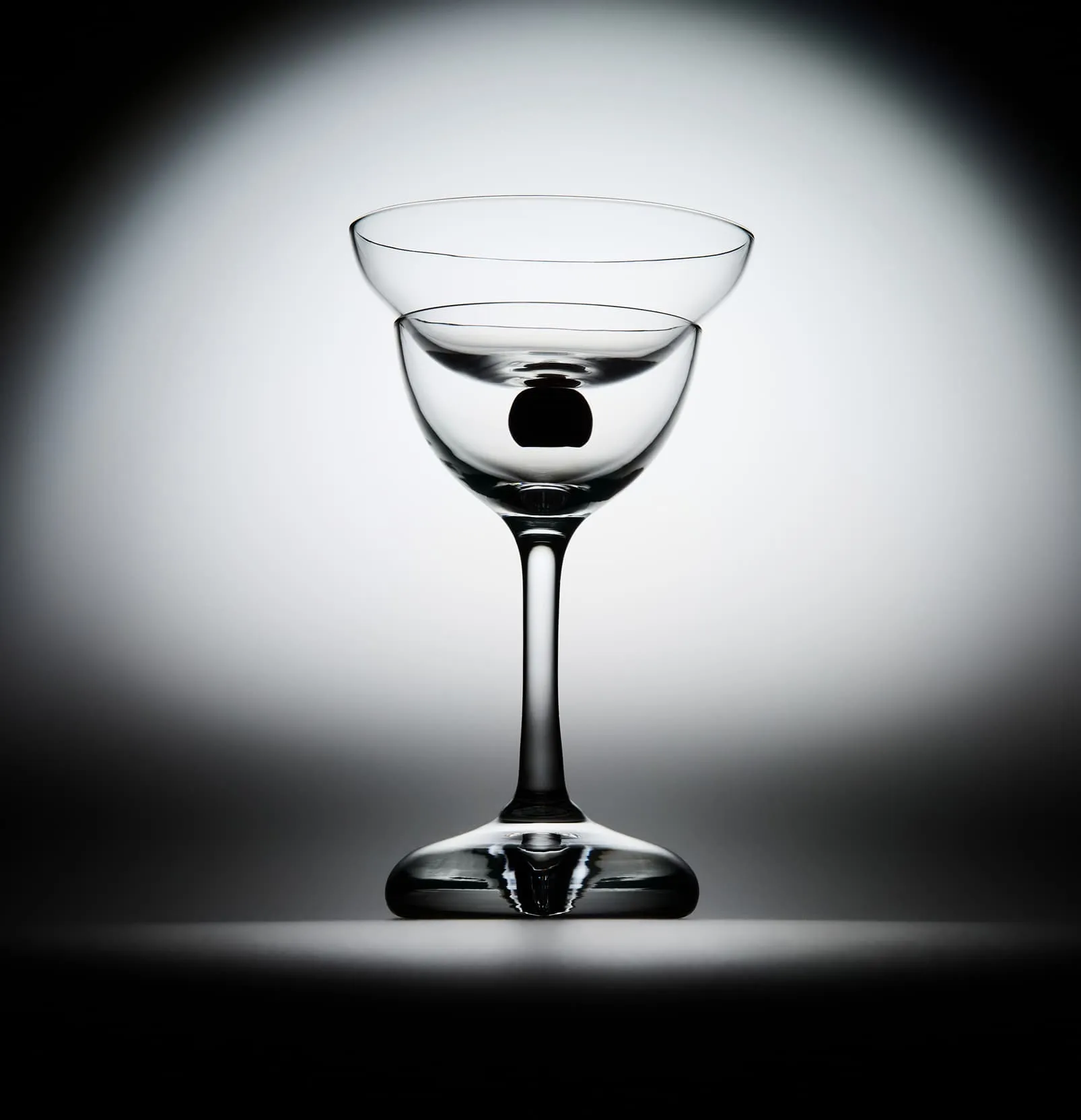 Minimalist cocktail glass with cherry, luxury product photography for MAX ID NY project.