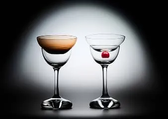 Minimalist cocktail glasses with layered liquids, product photography for MAX ID NY project.