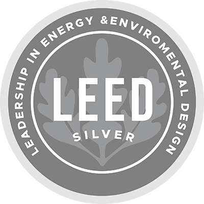 Sello gris de certificación LEED Silver.
