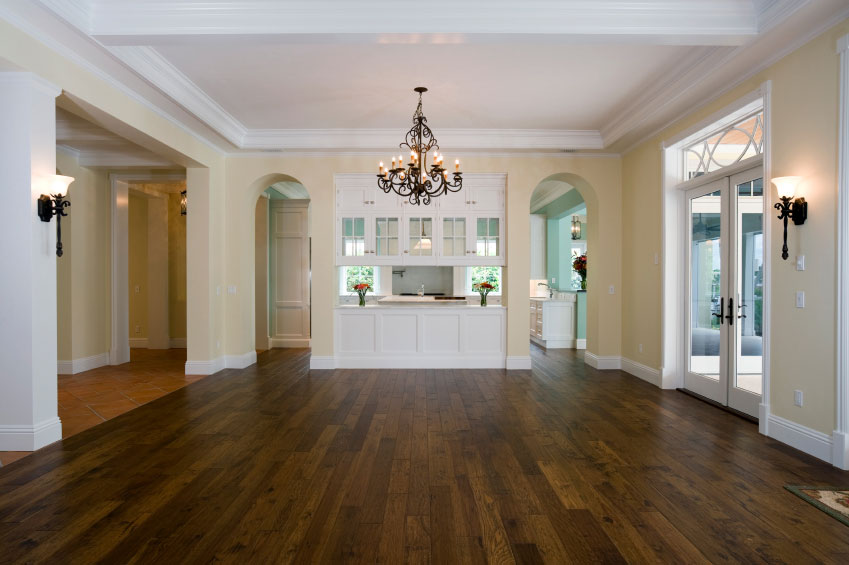 Open dining room with hardwood flooring and chandelier