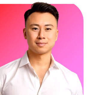 Portrait of a young man with short dark hair wearing a white shirt against a white background.