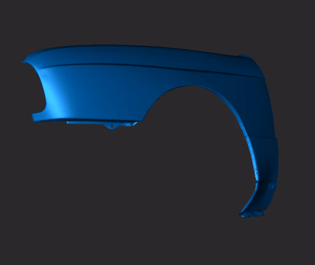 Blue car fender against a dark gray background.