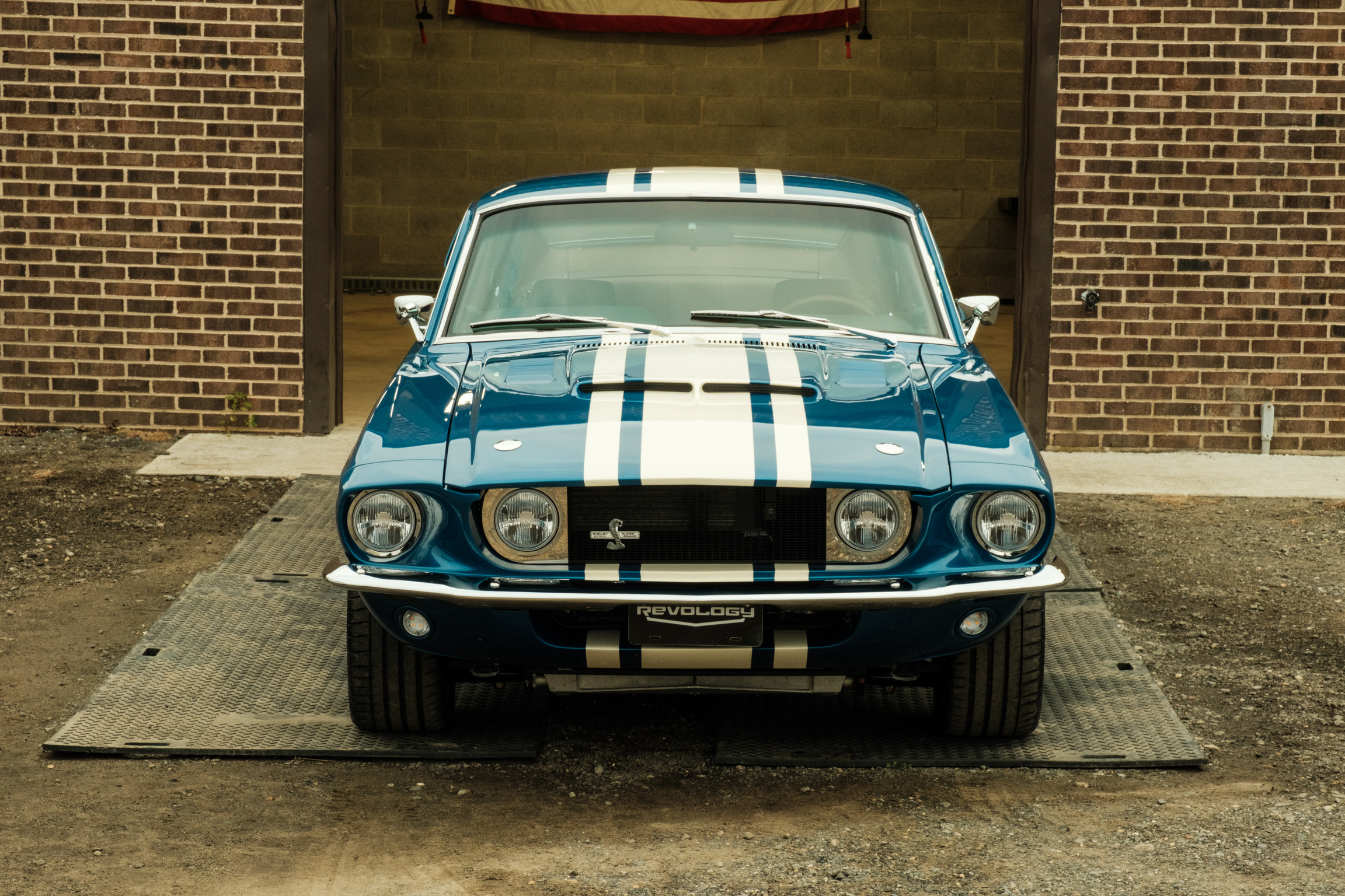 Blue Shelby Mustang with flawless paint correction by Dynamite Details studio in Delaware