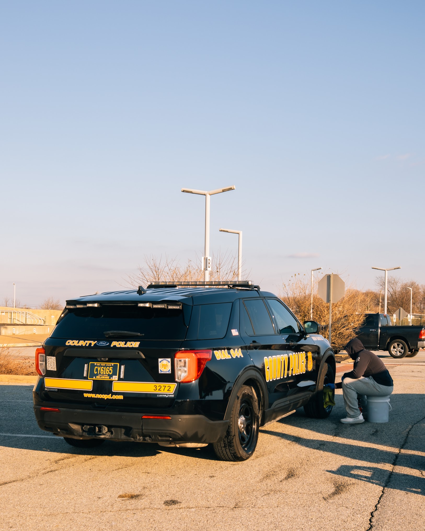 County police vehicle detailed during Dynamite Details community volunteer event