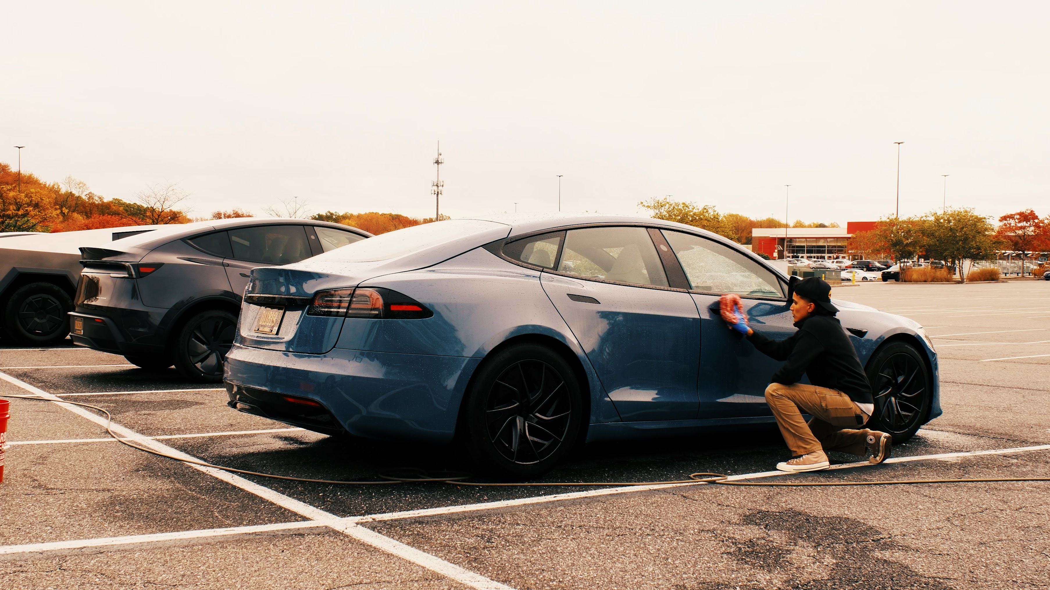 Blue Tesla with premium Revivify coating showing deep gloss protection