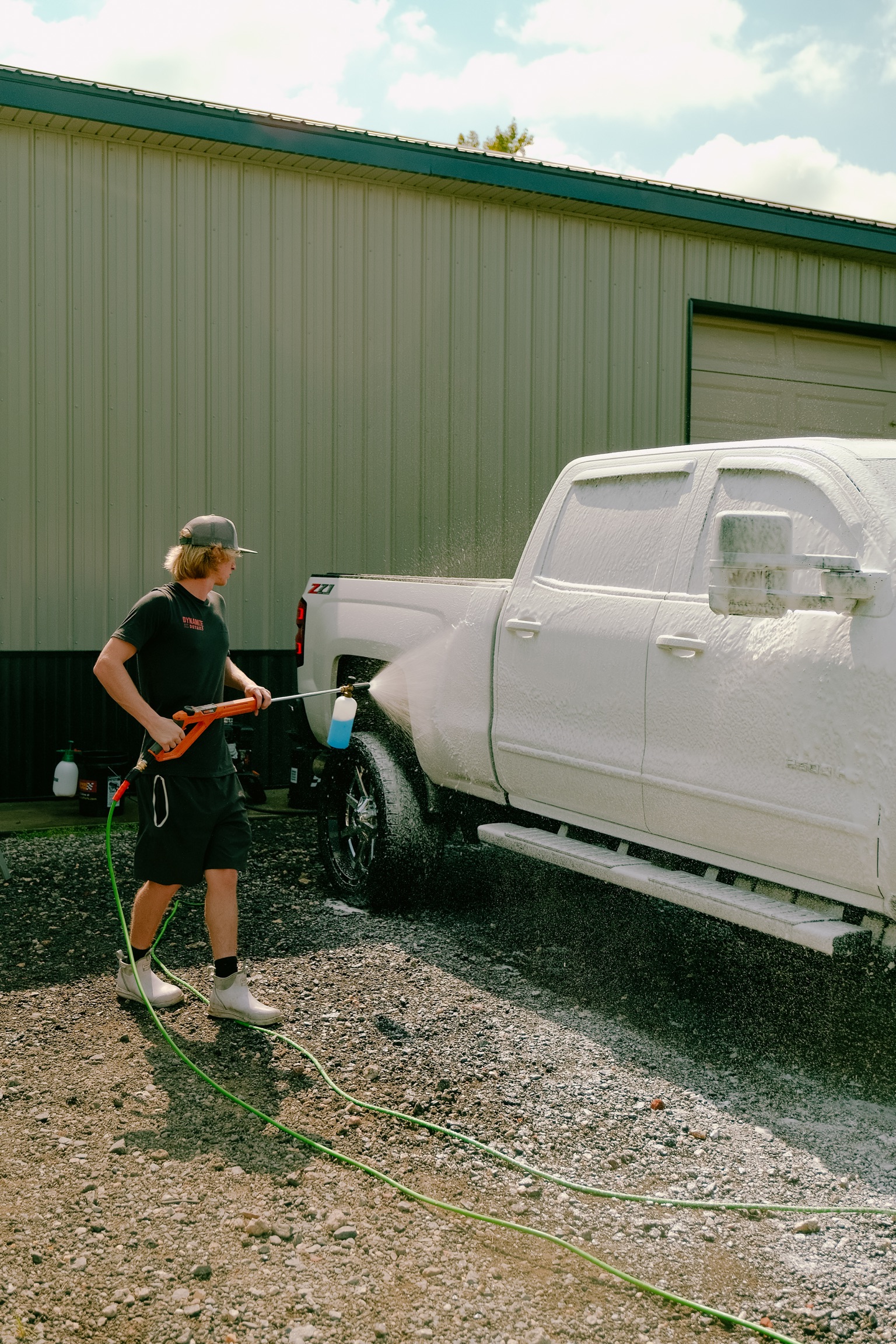 Exterior car detailing with decontamination and hydrophobic sealant application in Delaware