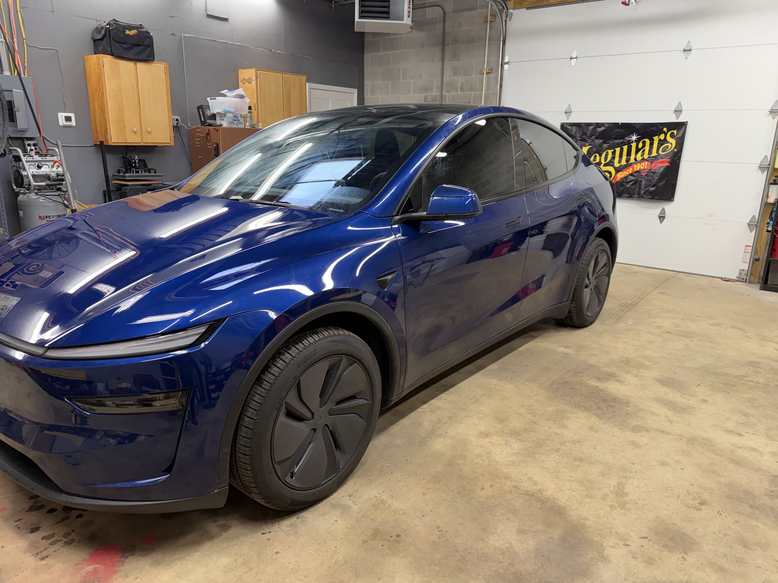 Blue Tesla Model 3 with premium paint protection by Dynamite Details