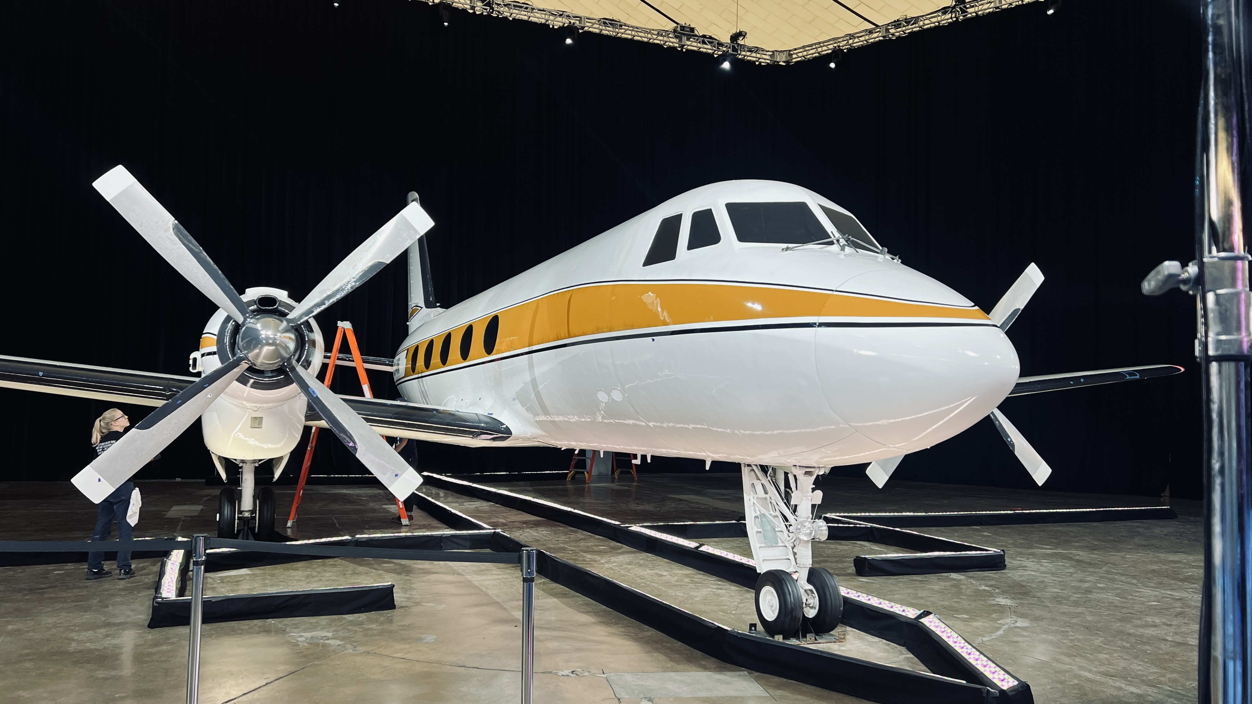 Dynamite Details team performing professional ceramic coating application in Delaware studio