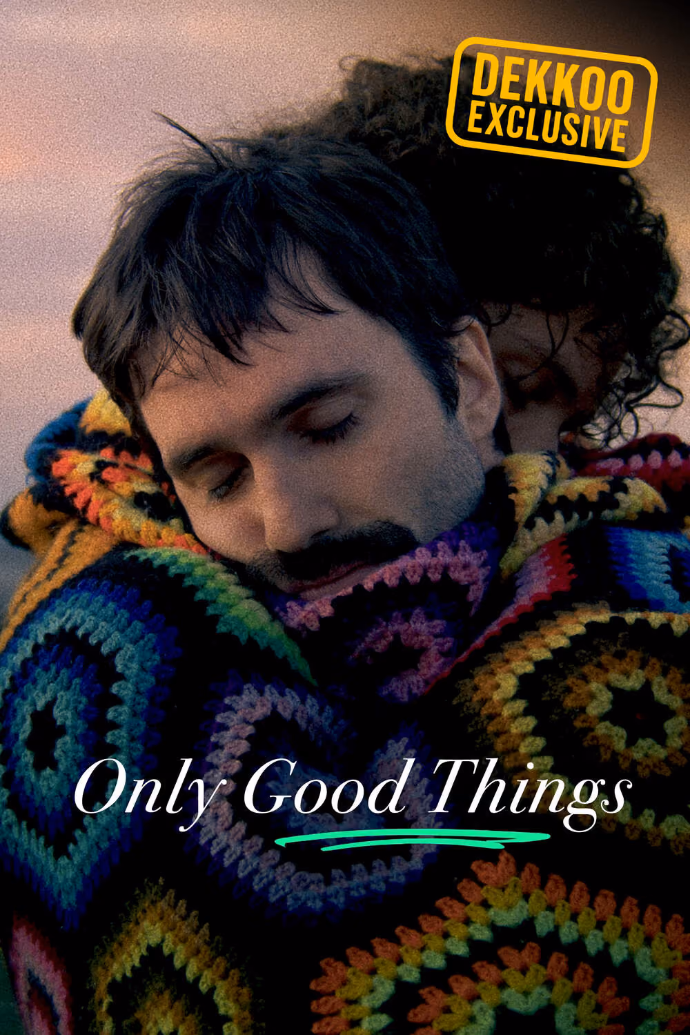 Only Good Things gay film on Dekkoo, featuring two men embracing under a colorful crocheted blanket.