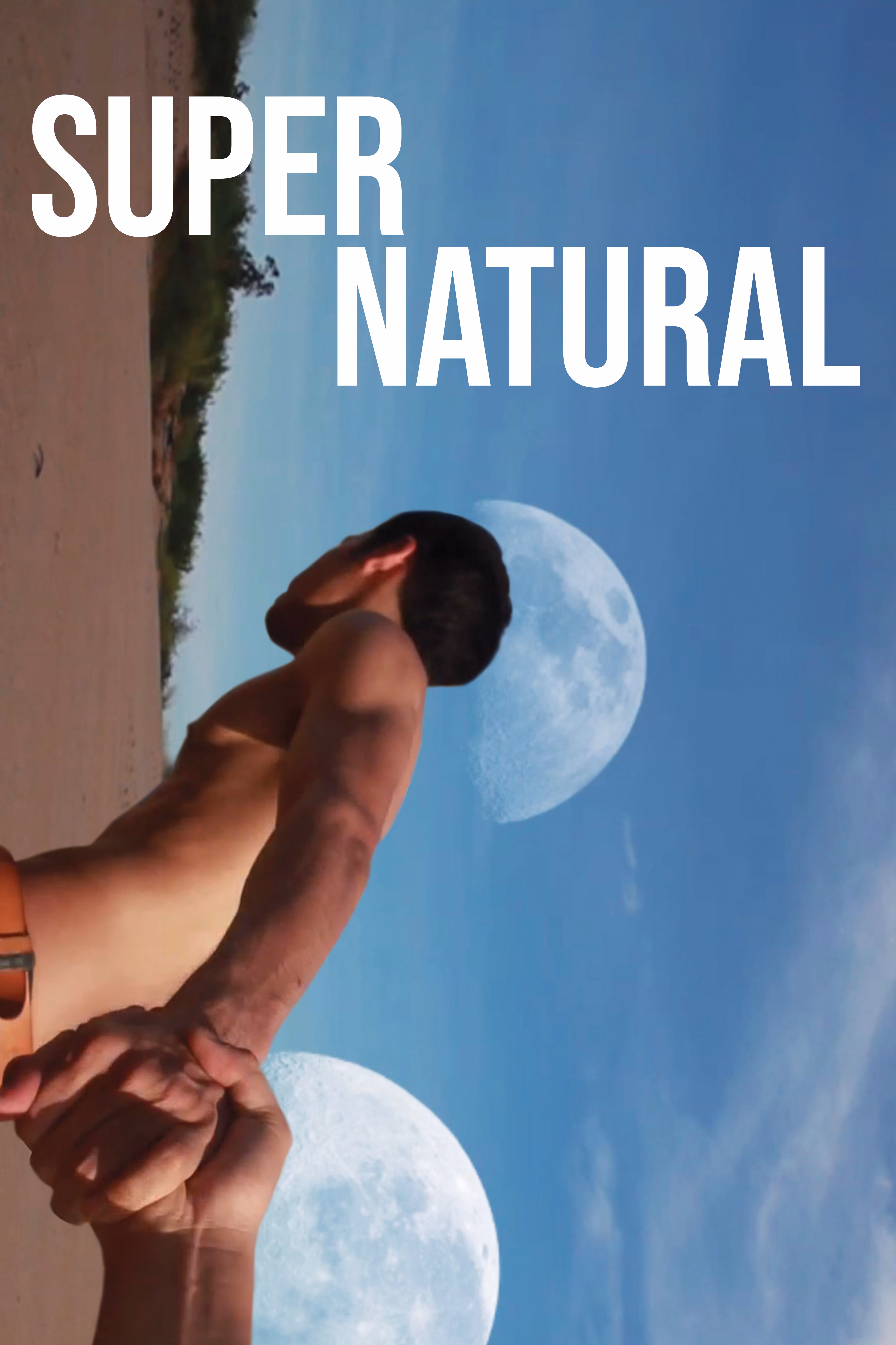 Supernatural movie poster featuring a shirtless man standing on a beach beneath two glowing moons in a blue sky.