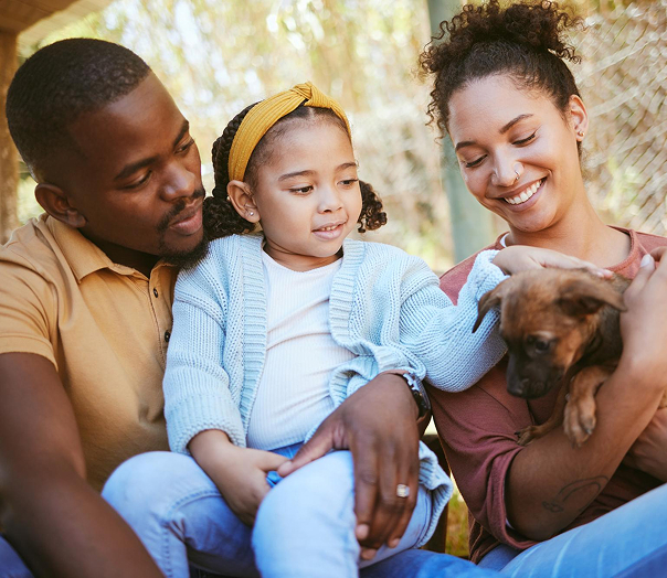 A family smiling together, representing Integral Health's patient-centered behavioral healthcare approach