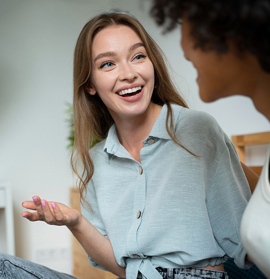 Healthcare provider smiling, representing Integral Health's partnership opportunities for primary care organizations