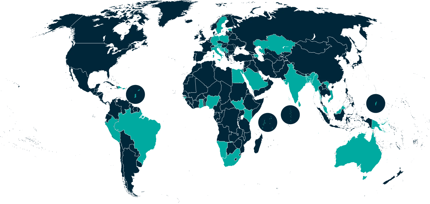 Image showing the world map with countries marked in two shades of blue and islands zoomed in a dark-blue circle.